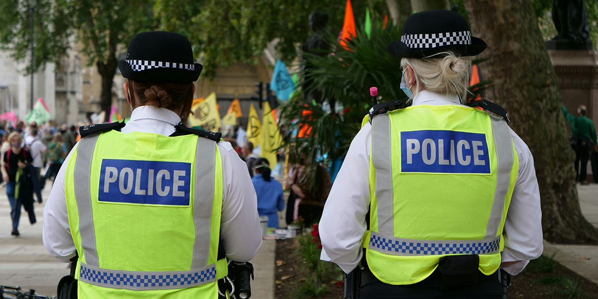 Police officers in hi-vis jackets.