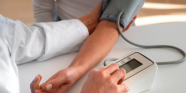 Someone having their blood pressure taken