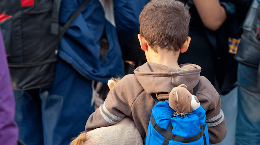A young child in a crowd