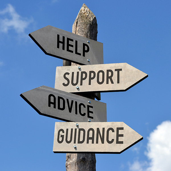 Sign post with arrows reading Help, Support, Advice, Guidance