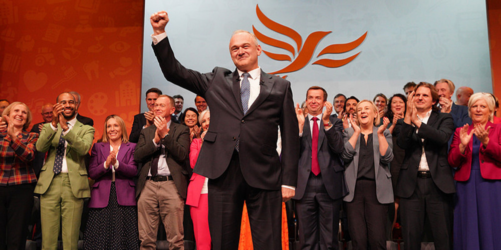Ed Davey MP after delivering his speech at Autumn Conference in front of Lib Dem MPs.