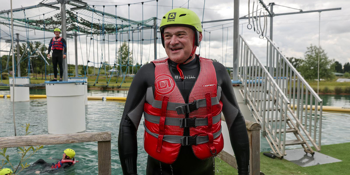 Ed at an aqua high ropes obstacle course.
