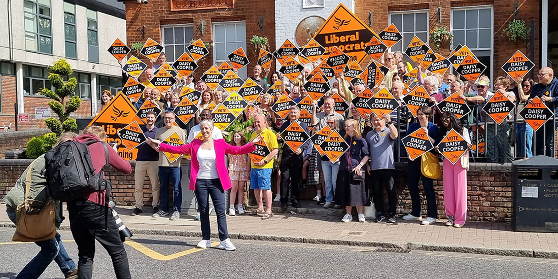 Lib Dem supporters pose with diamonds for the camera.