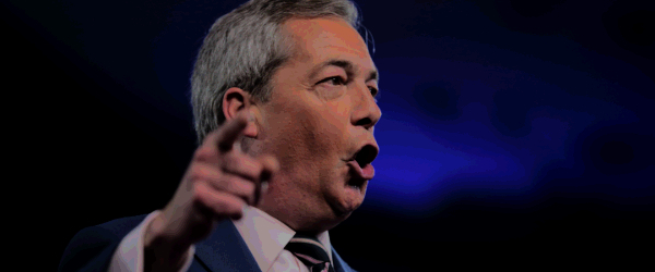 Nigel Farage giving a speech and pointing his finger